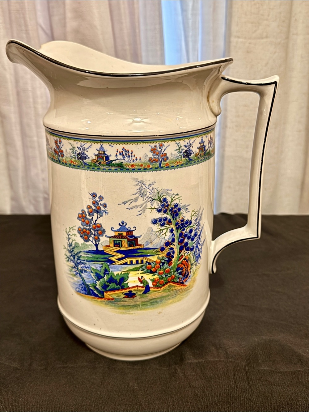 1910 Porcelain rare vintage jug. Made in England. beautiful colors, small chip